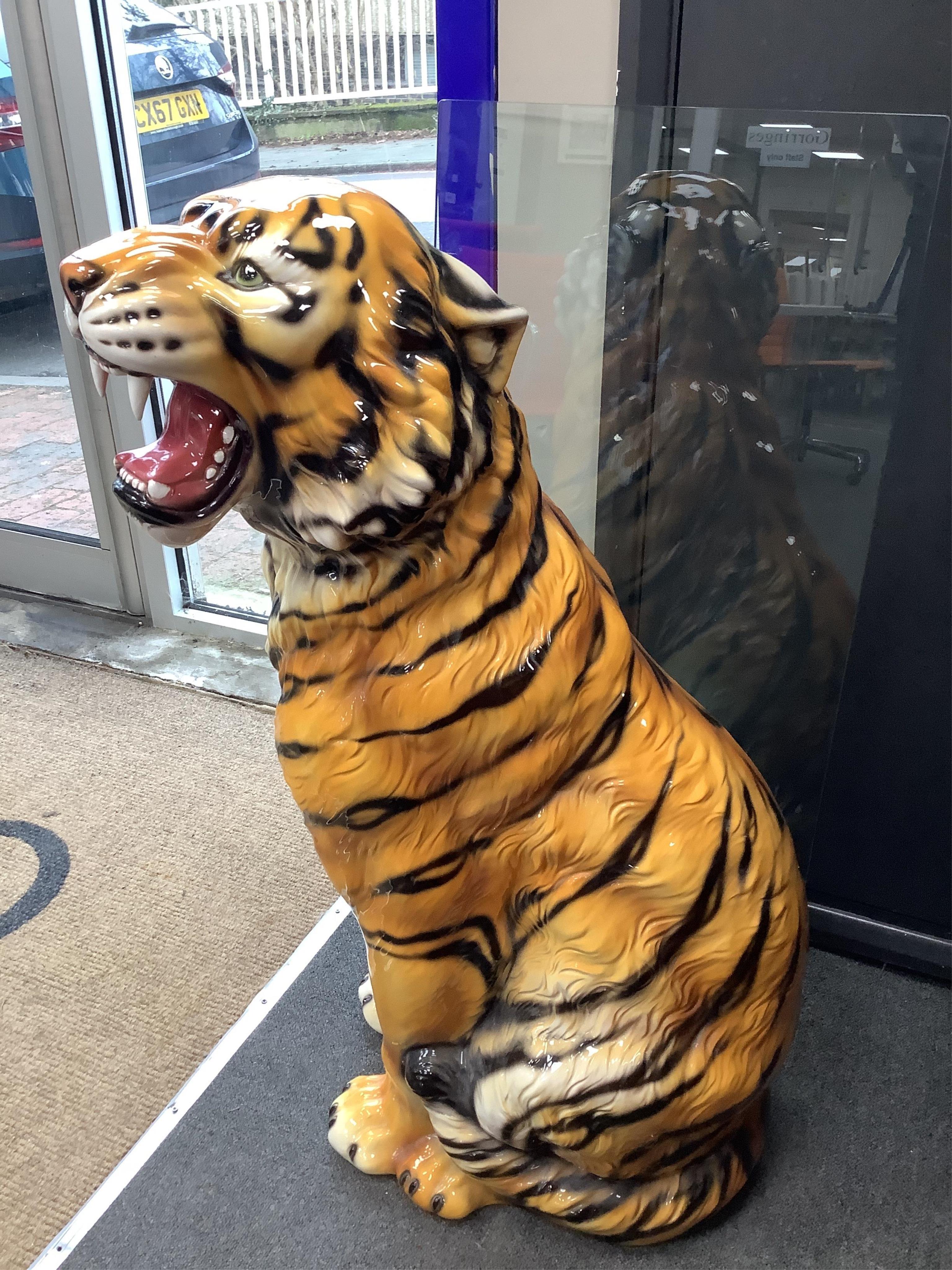 An Italian majolica seated tiger, height 90cm. Condition - good